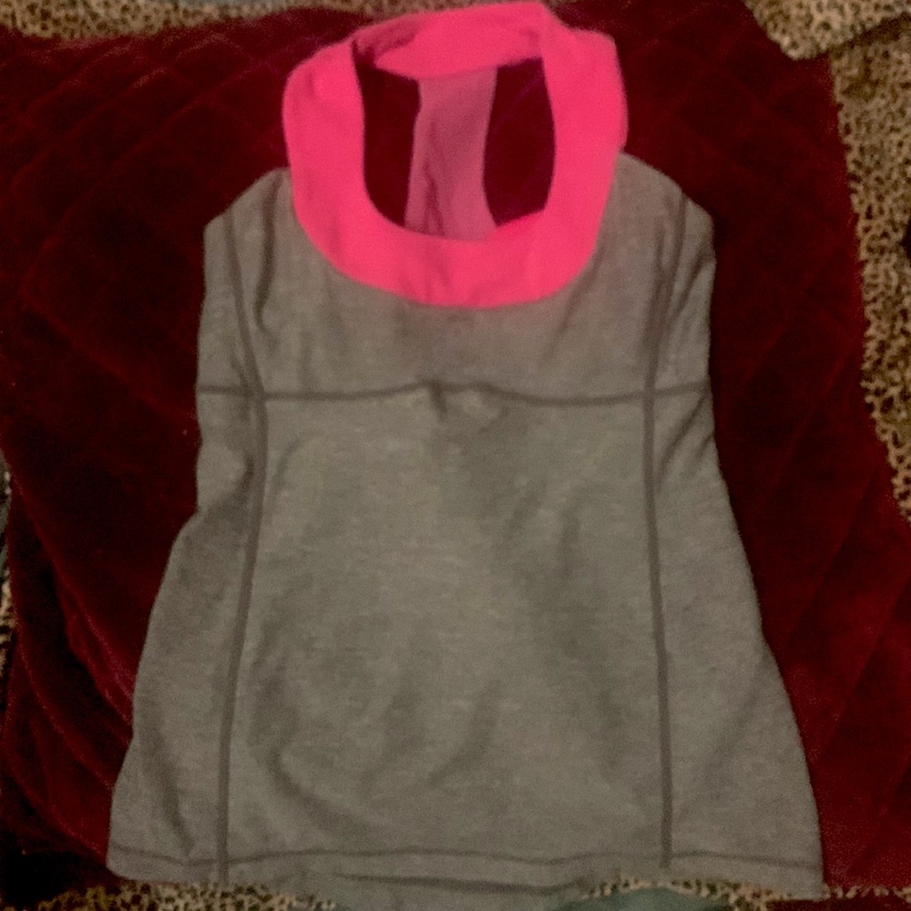 Lululemon scoop top. Size 4. Great compression. Nice add to your workout gear.